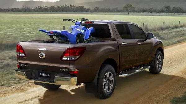 Mazda BT-50 2018 loading a motorbike