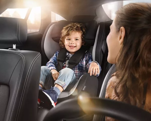 Baby in car with mother