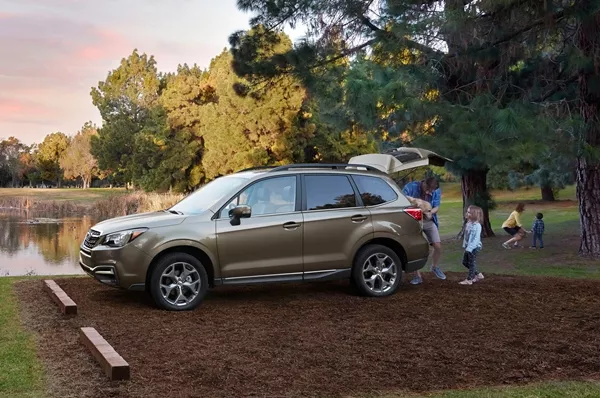 A family and their Subaru Forester