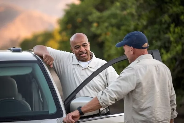 a car buyer talking to a private car seller