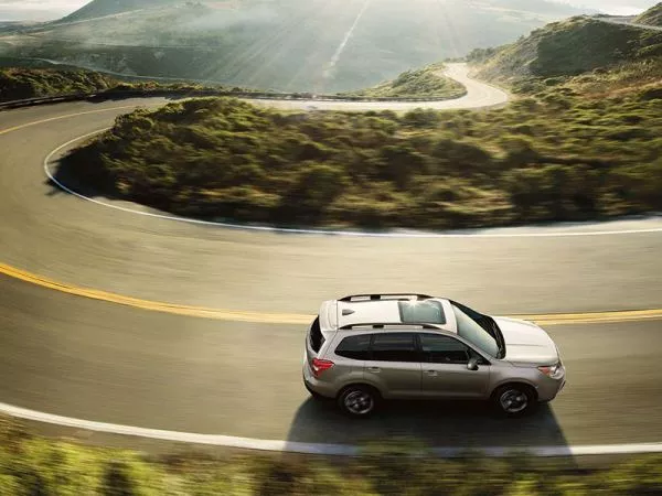 SUVs are inherently less fuel-efficient than compact cars an SUV on the road