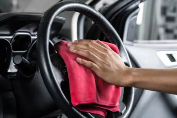 Cleaning a synthetic resin steering wheel