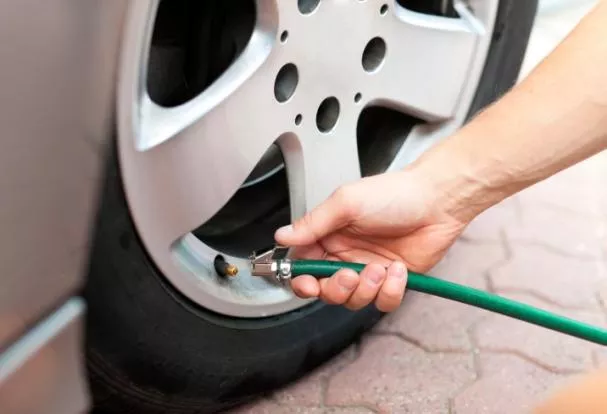 inflating car tire