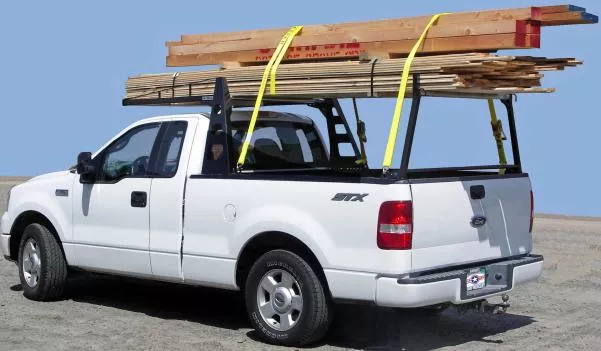 A truck with carrying stuff on its truck racks