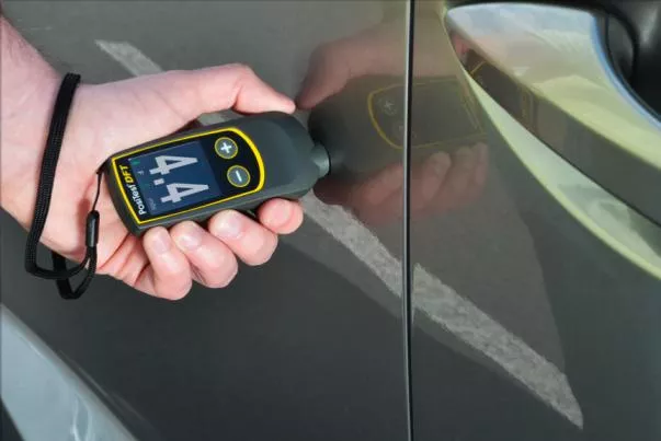 Using a magnet to check on car panel