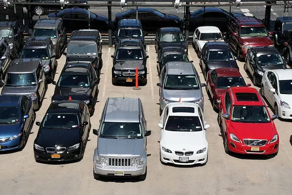 cars parking under sunlight