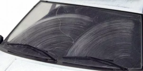 Clean the inside of the windshield with a soft and dry piece of cloth if it is blurred Windshield is blurred because of dust